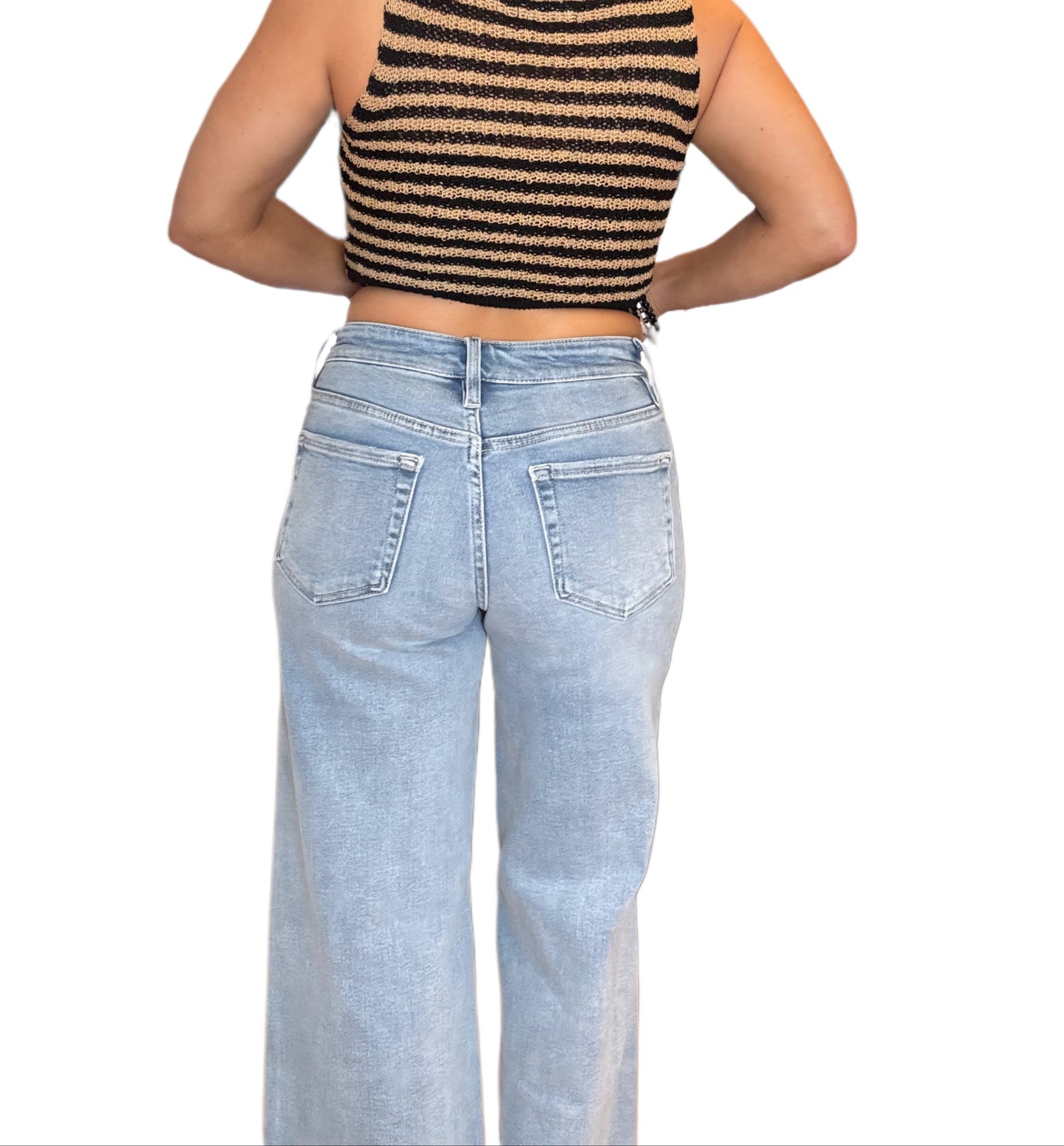 High rise flared denim jeans with raw hem