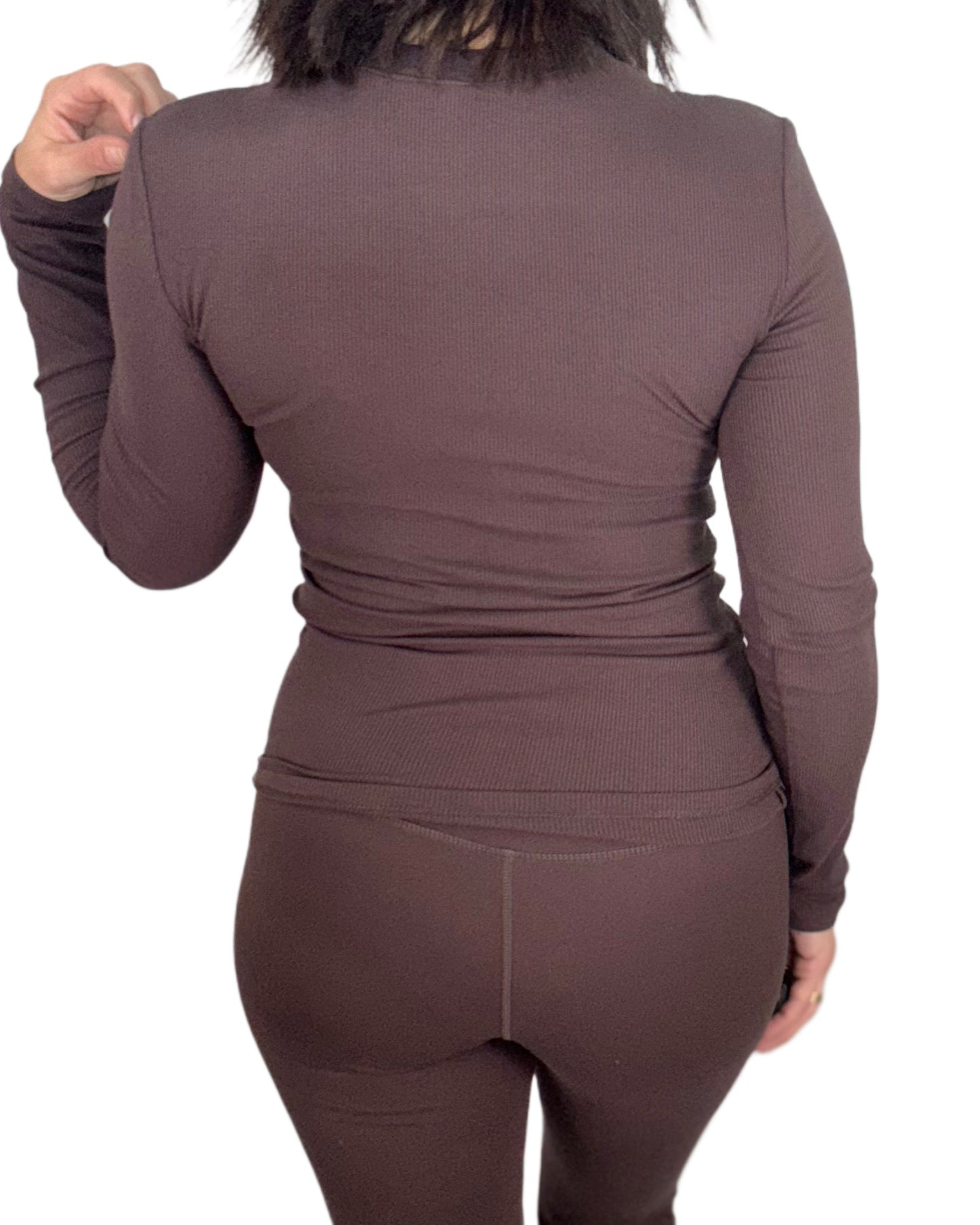 Brown long-sleeve top and pants set on a white background
