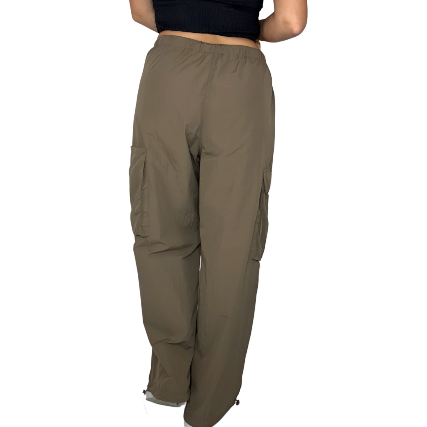 Back profile of brown cargo pants on a white background