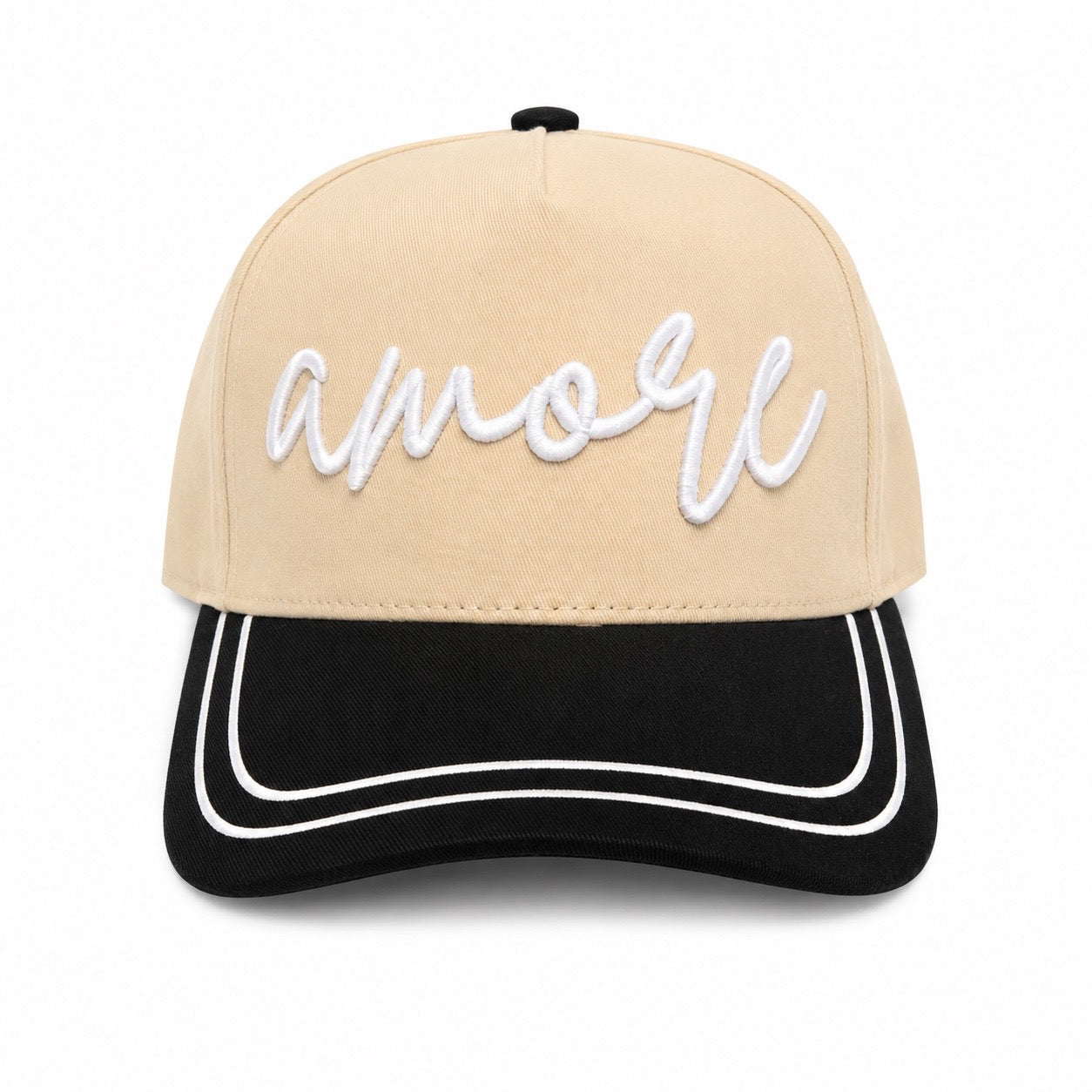 Tan hat with black bill and a double white stripe around the parameter and the word Amore across the front on a white background