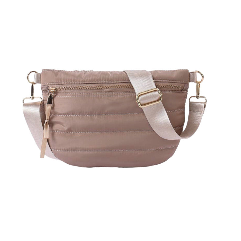 Mocha crossbody bag with a strap on a white background
