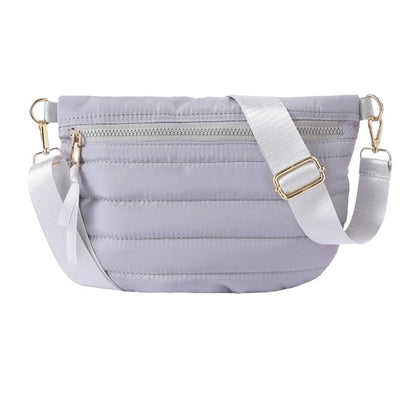 Light grey crossbody bag with a white strap on a white background