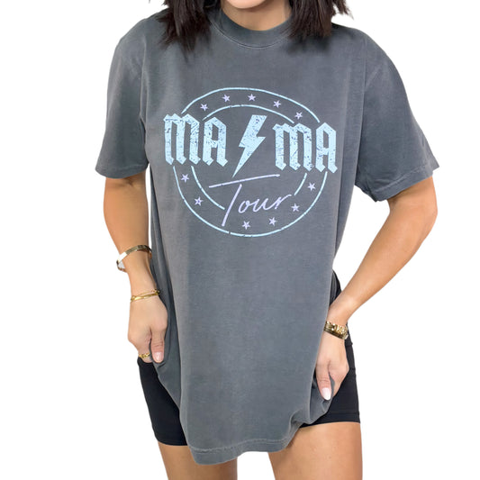 Woman wearing a gray t-shirt with 'MAMA Tour' design on a white background