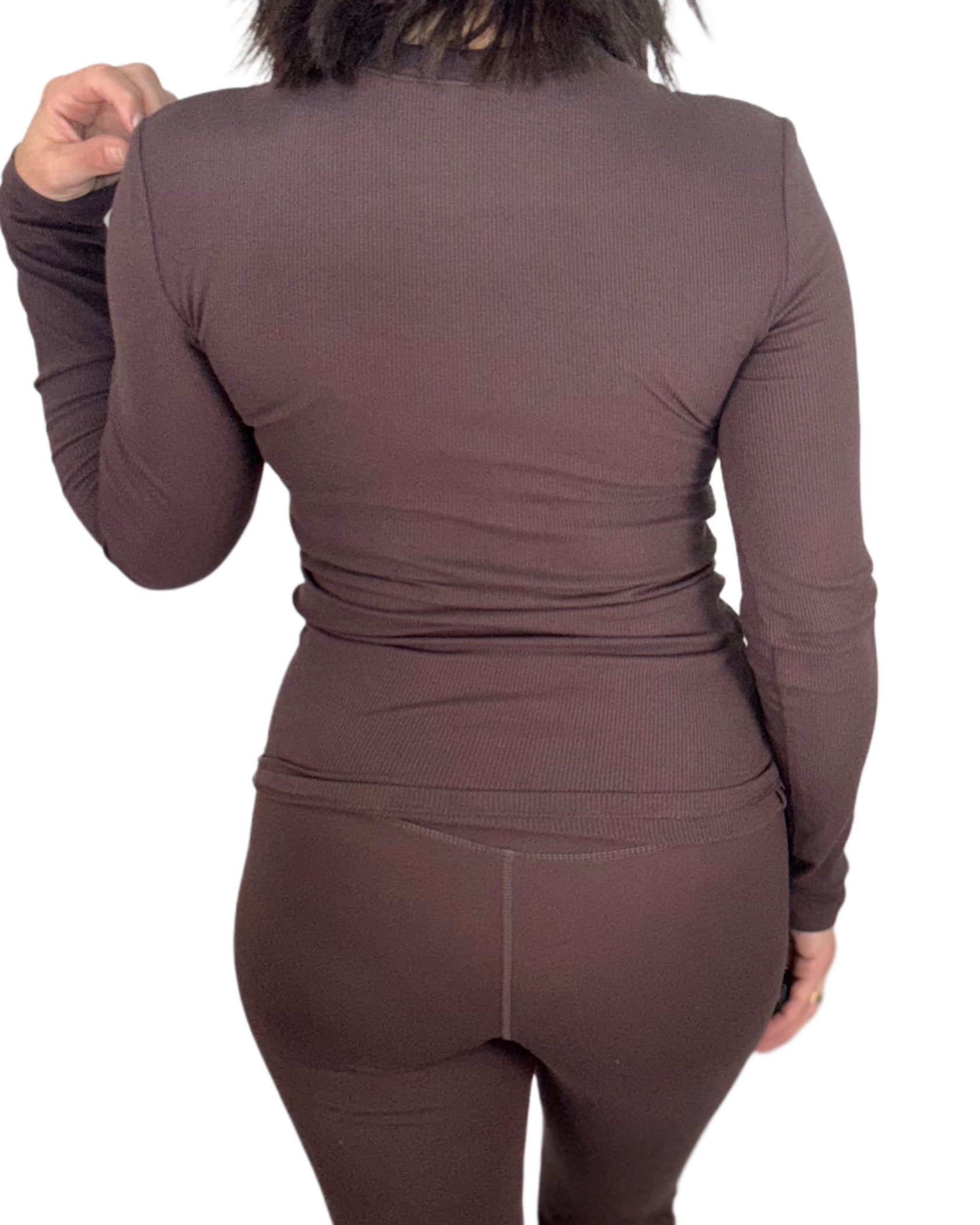 Brown long-sleeve top and pants set on a white background