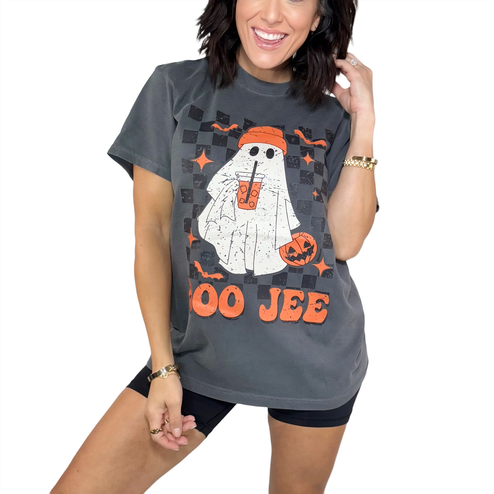 Woman wearing a Halloween-themed t-shirt with a ghost design and 'Boo Jee' text.