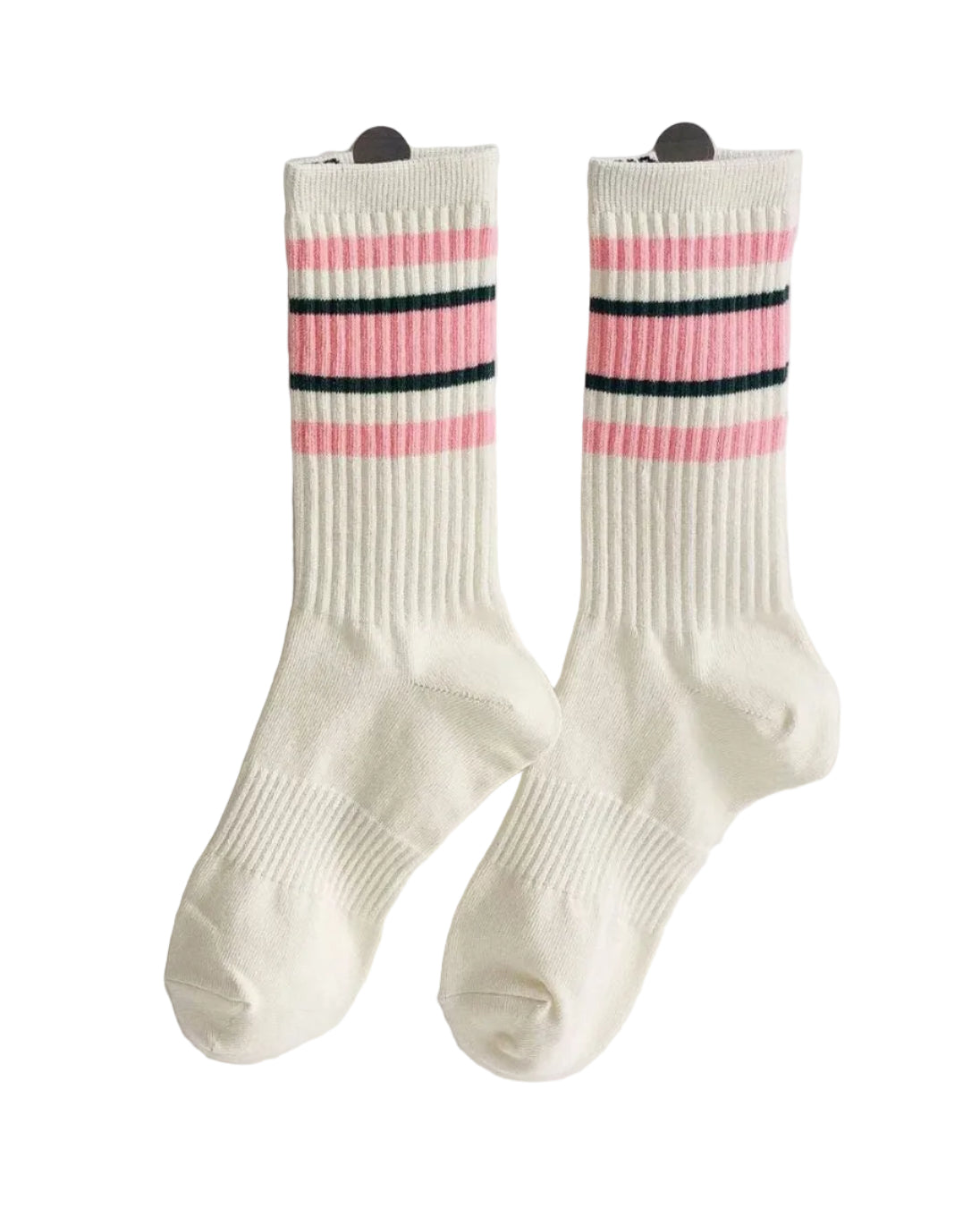 A pair of ribbed crew socks in off-white with pink and black horizontal stripes near the cuff, displayed on a white wall n