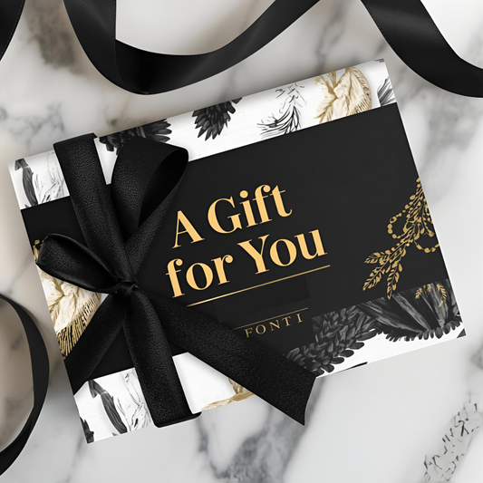 Gift card with black ribbon on a marble surface